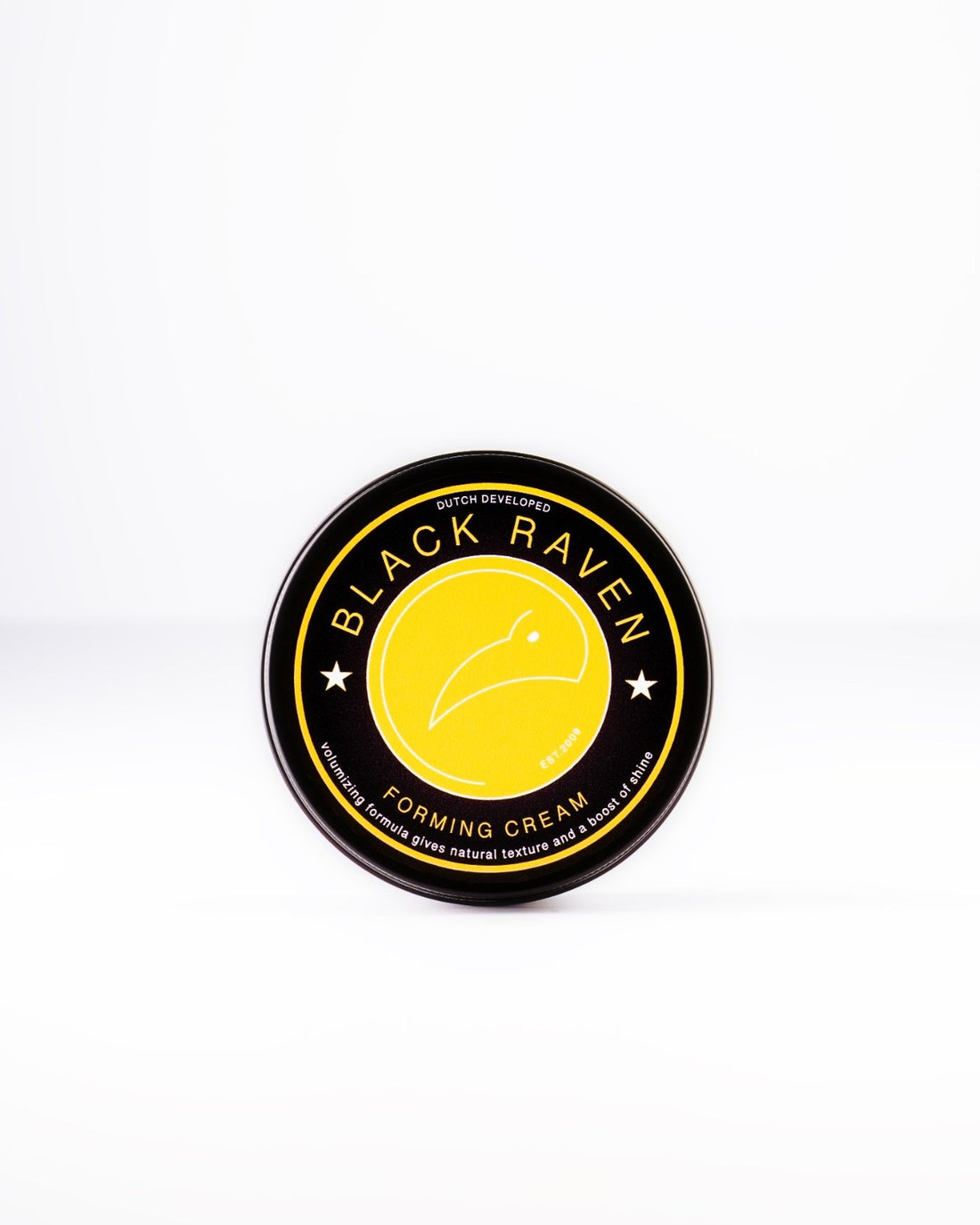Black Raven Forming Cream for natural texture and shine, in a black and yellow container.