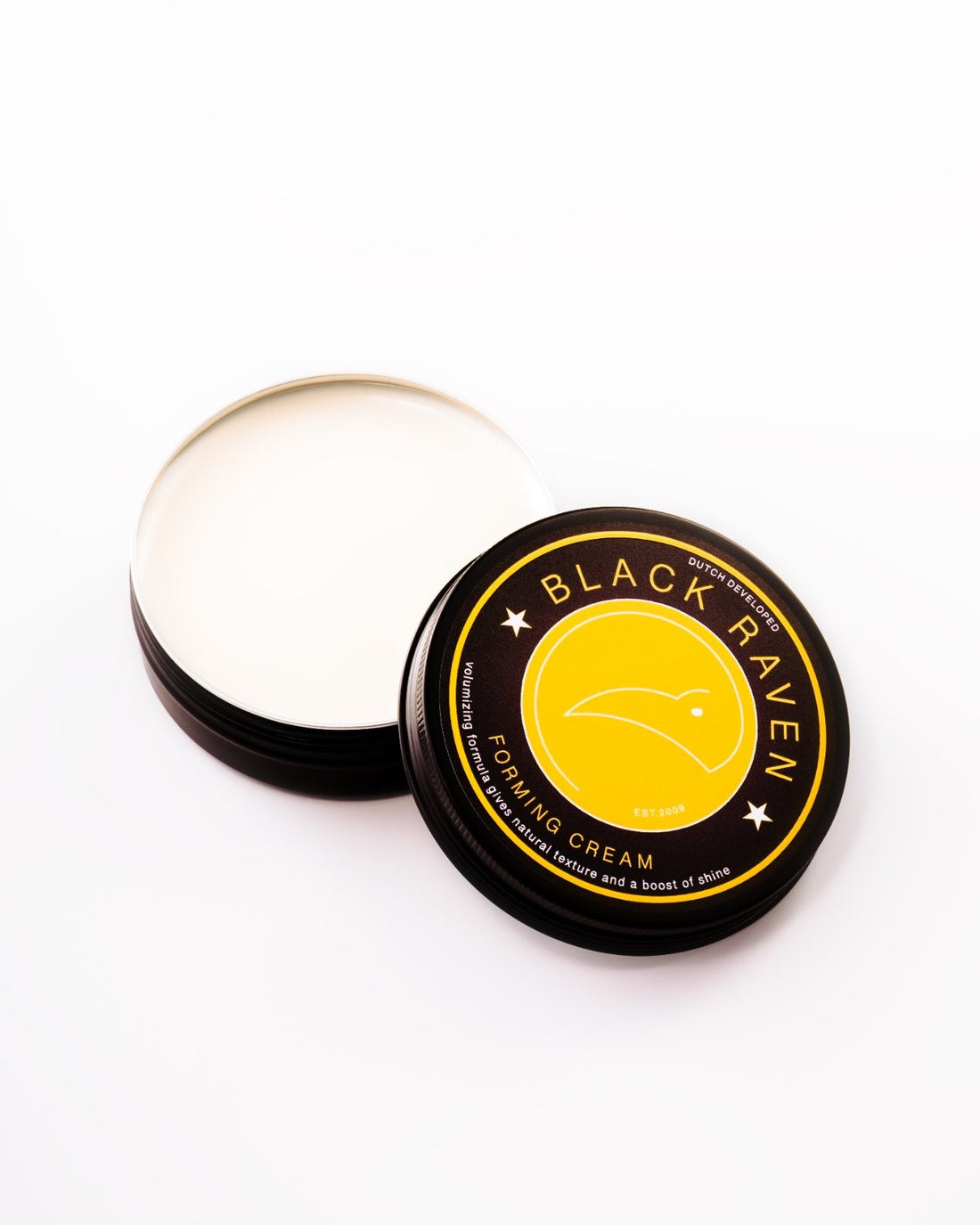 Black Raven Forming Cream for natural texture and shine, in a black and yellow container.